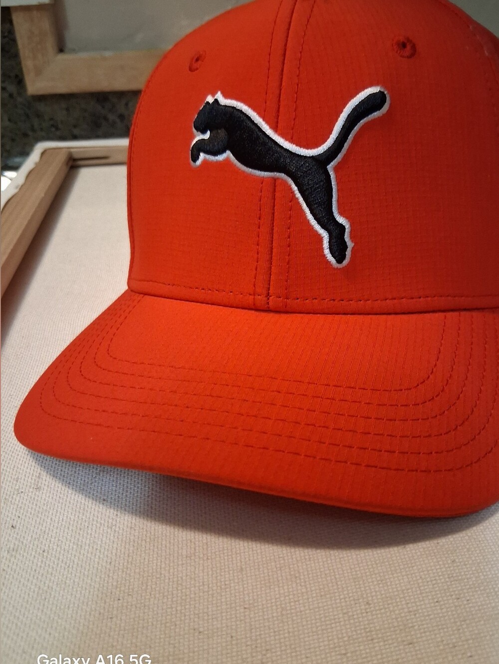 Adult S/M Stretchfit/zpro Fit .red PUMA Dillon Cap. Red color Is an orange red.